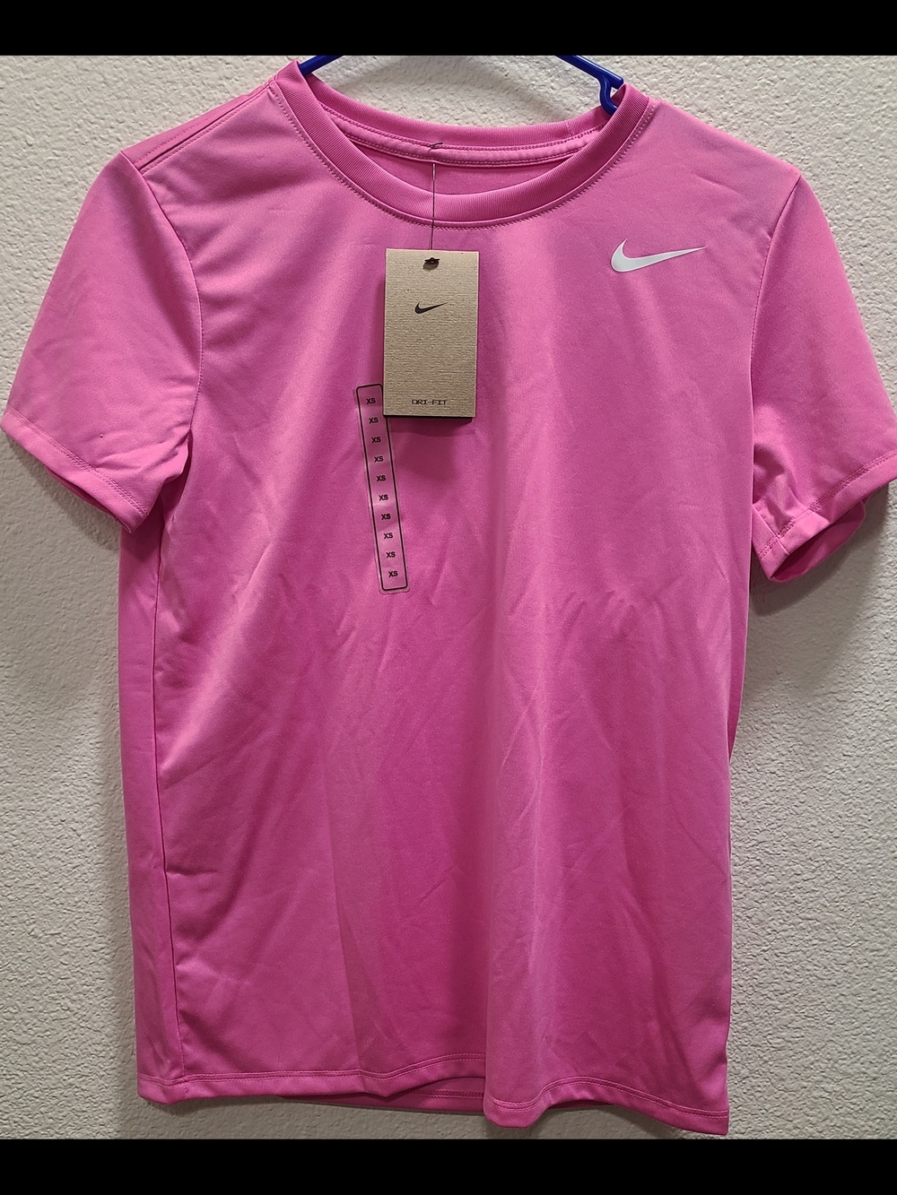Nike Pink Short Sleeve Athletic Tee with White Swoosh